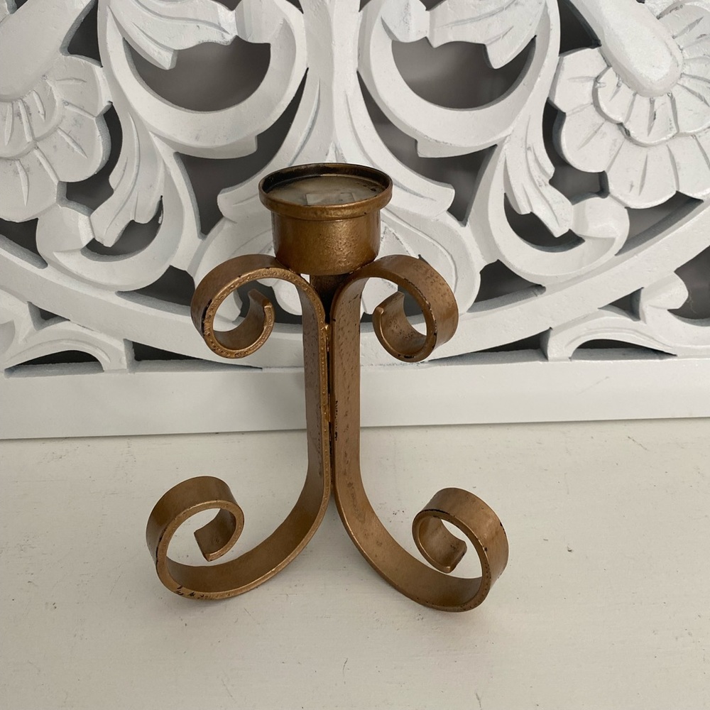 Vintage cast iron candle holder
